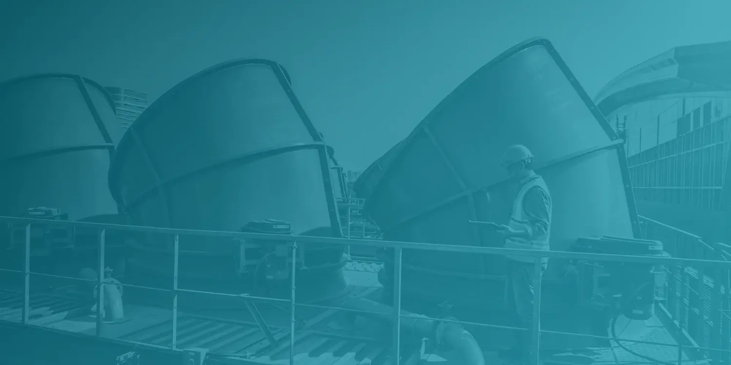 Worker on the roof of an industrial building